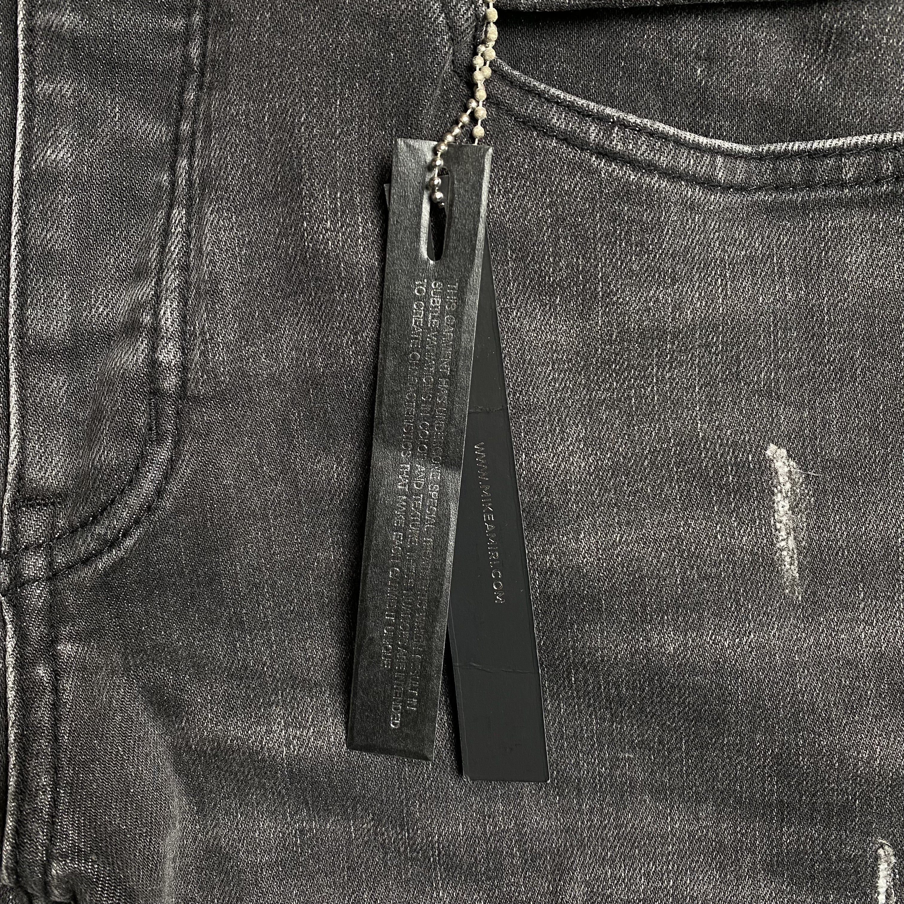 AMIRI SLASH SLIM JEANS
