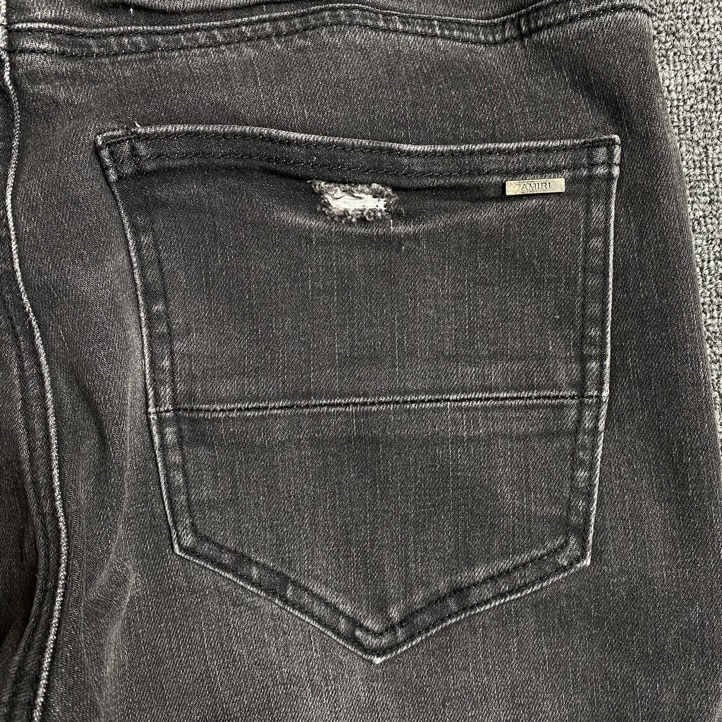 AMIRI SLASH SLIM JEANS